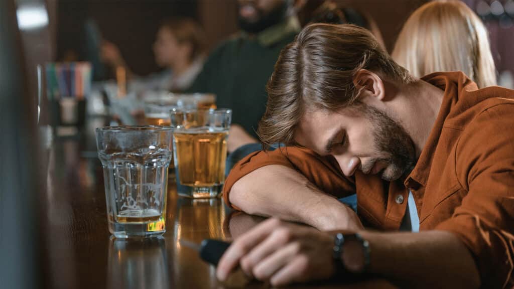 very drunk man automobile keys bar friends