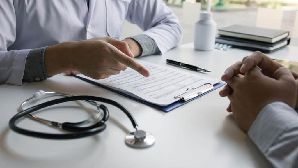 Doctor talking to the patient about treatment