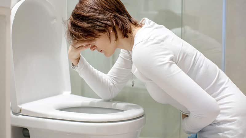 woman experiencing dry heaving