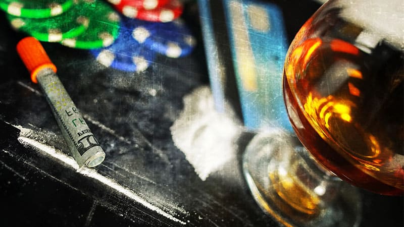 cocaine and alcohol glass on a table