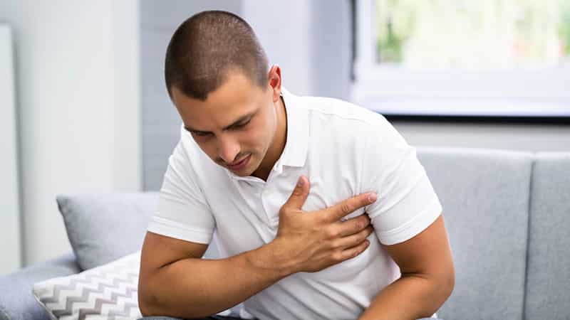 man having chest pain